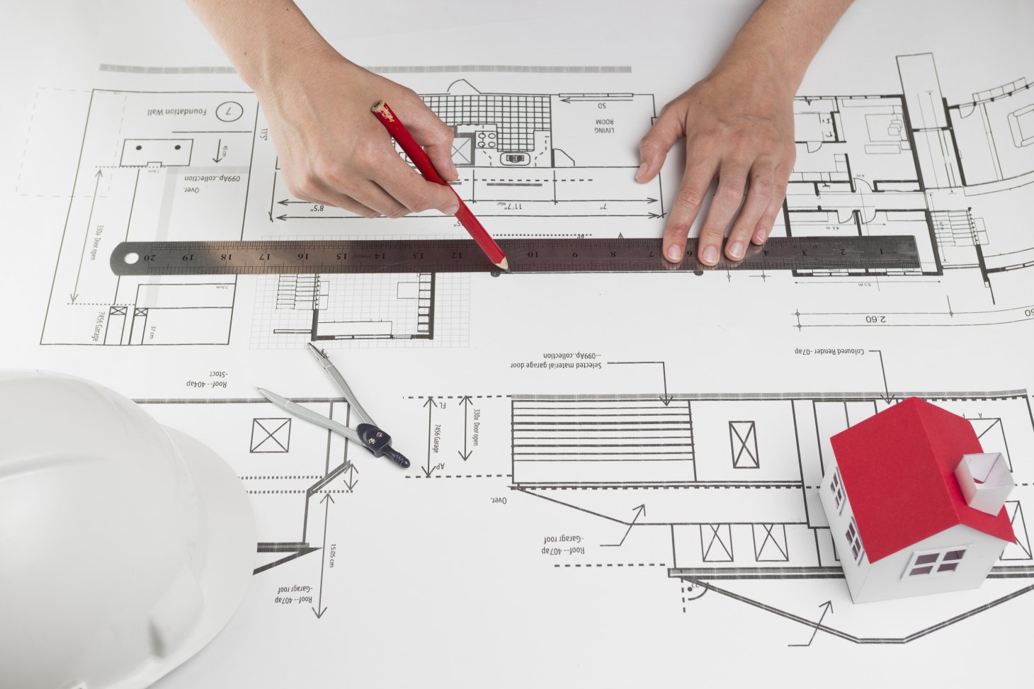 close-up-human-hand-drawing-line-blueprint.jpg