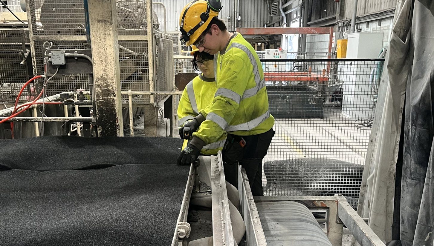Apprentices at work in an H+H factory